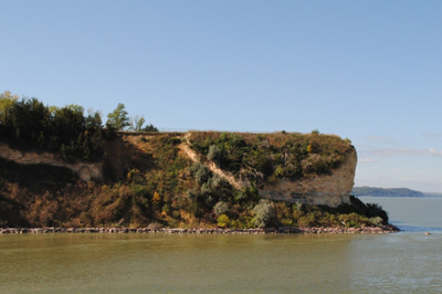 Small white cliff on a muddy river